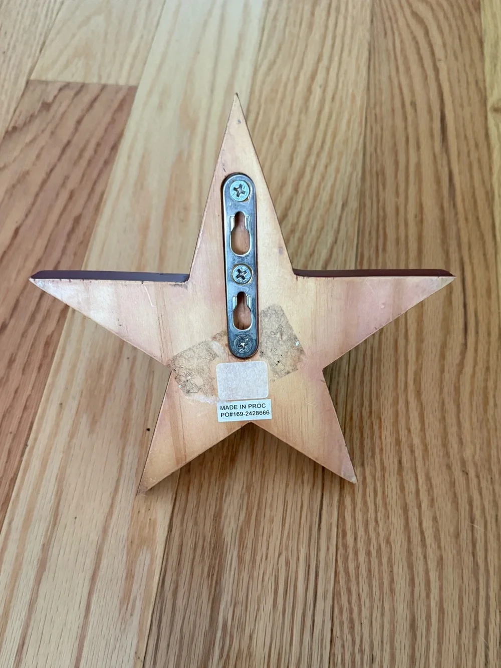 Pottery Barn distressed star shaped wall hooks maroon color 7”
